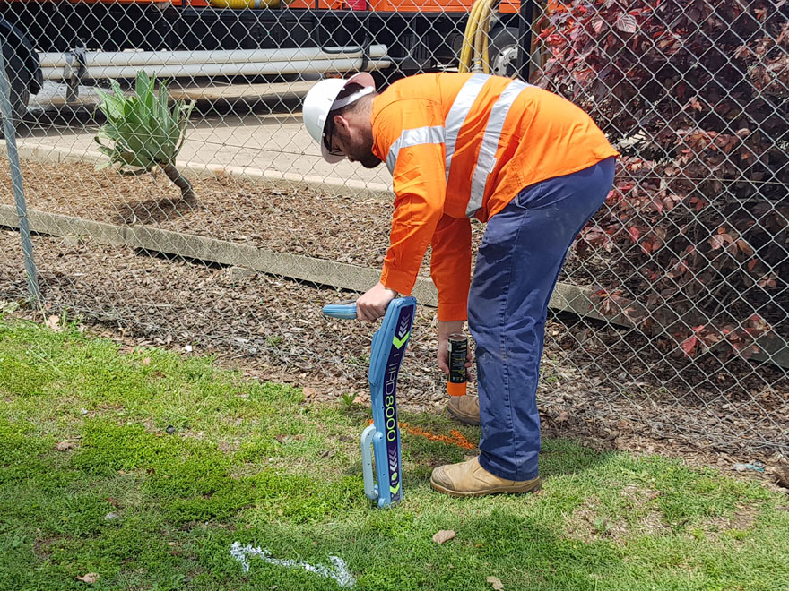  Service locator Robbie marking underground services for excavation purposes